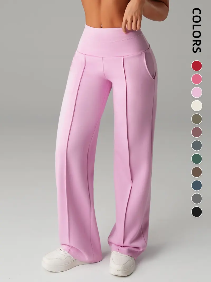 Pantalones de mujer de tiro medio, cintura elástica y pernera ancha; estilo deportivo casual, cómodos bolsillos laterales; prenda versátil para primavera y otoño; ideales para el día a día; moda femenina.